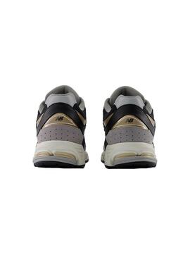 Zapatilla Hombre New Balance 2002R Negra Dorado