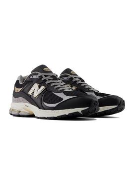 Zapatilla Hombre New Balance 2002R Negra Dorado